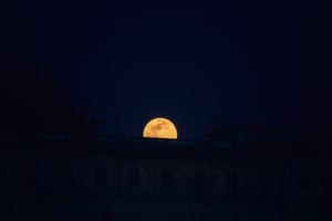 Full moon over Udaipur City Palace